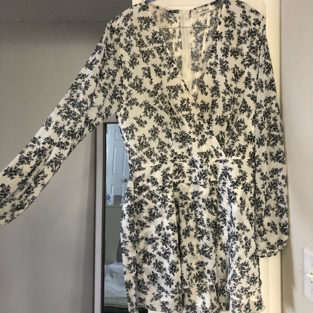 Thin light romper with a tie in front